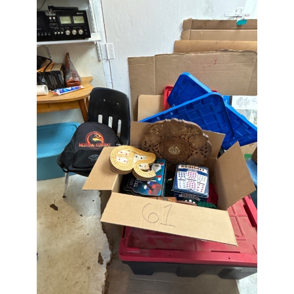 Collection of games, backpacks, and two red and black totes