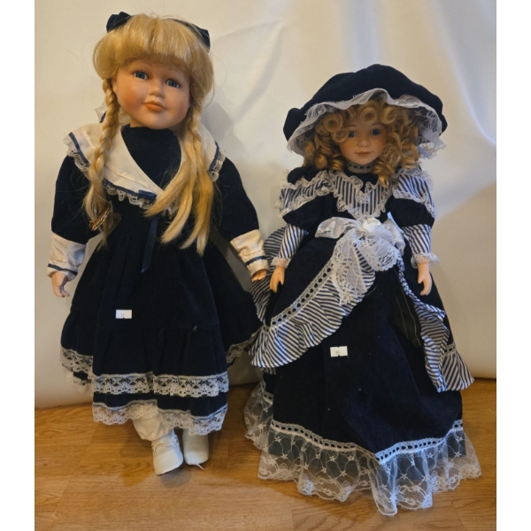 Porcelain Dolls: Girls in Blue Velvet. Tallest is 25T