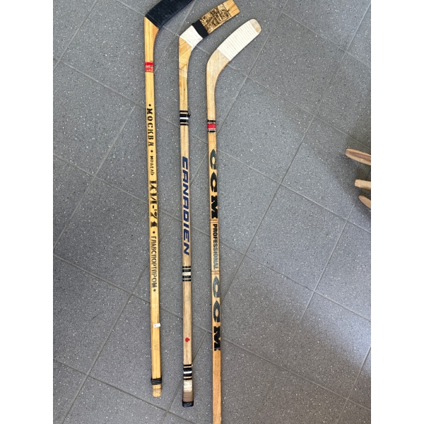 Three Wooden Hockey Sticks by CCM, Canadien, and Others