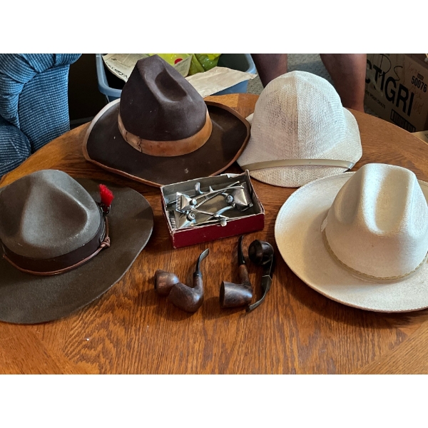 Collection of vintage hats from the Boy Scouts of America association, Safari hat, and two vintage c