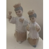Image 1 : LLADRO Pair of Porcelain Altar Boys (Lace Trim on Larger Boy Damaged) - 5T 