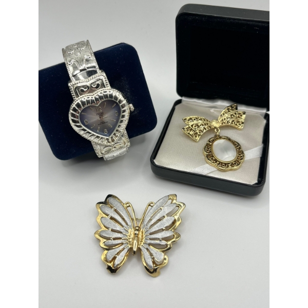 Vintage Mother of Pearl brooch pin, butterfly pendant gold tone, and a Acuci Japan quartz wrist watc
