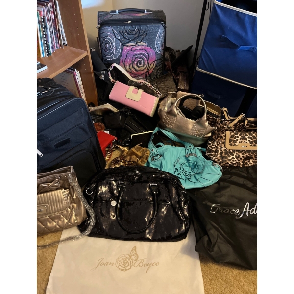  Large collection of new and used handbags, suitcases, wallets, and purses