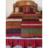 Image 2 : Wooden Queen Sized Headboard w/ Multicolored Striped Comforter & Pillows