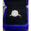 Image 1 : 5ct GRA Certified Round Brilliant Cut Moissanite with 14 Round Cut CZ's set in 925 Silver Ring