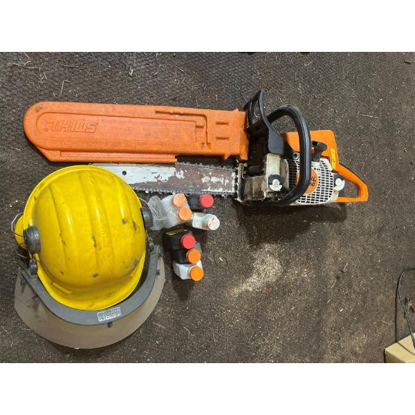 STIHL MS 250 chainsaw with oil and helmet