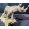 Image 3 : "African Thunder " Fine Porcelain Rhino on Wood Base