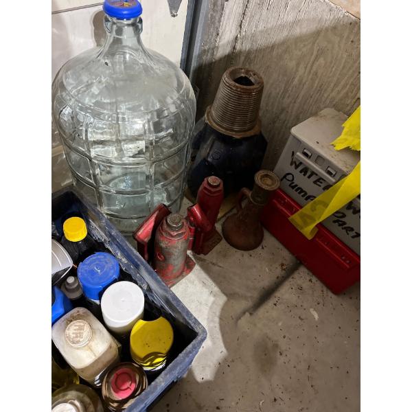 down hole drilling bit and two jacks and 1 antique Jack