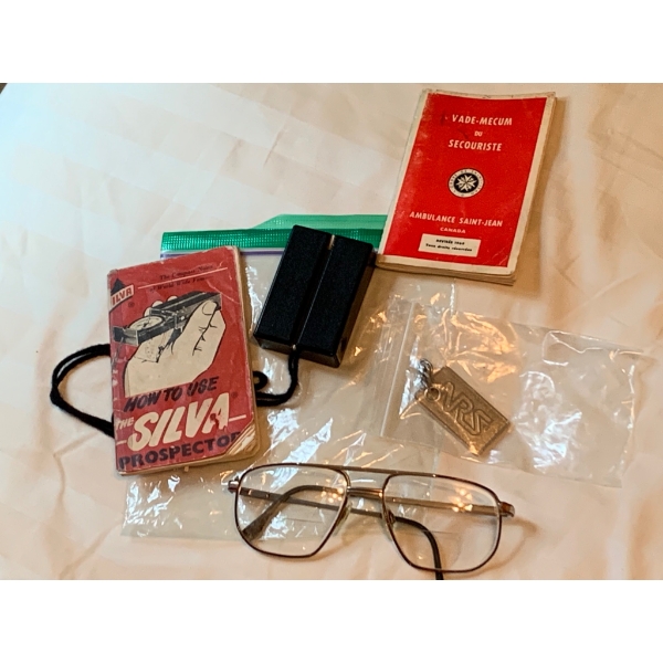 Survival/Thematic Items Including Silva Compass Guide, Glasses, and First Aid Manual