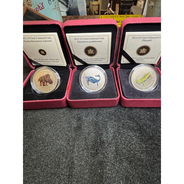 2012,2013,2014 coloured Dinosaur coins . All sold together