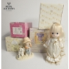Image 1 :  several Precious Moments figurines and a doll, 