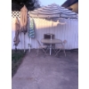 Image 1 : Outdoor Patio Set with Umbrella, Glass Table, and Folding Chairs