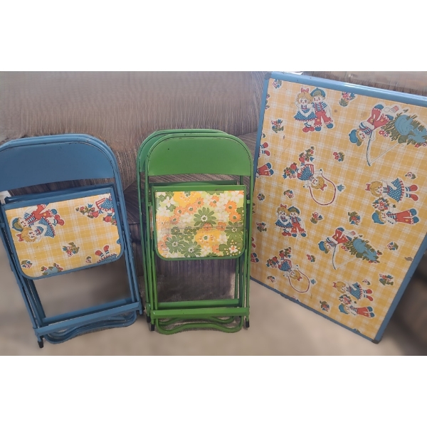Metal Children's Folding Table and 4 Chairs. Table 36 w 24 d 21 h.  Chairs 15 w 14 d 26 h