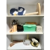 Image 2 : White simple cabinet with art supplies inside. 