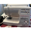 Image 2 : kenmore sewing machine with pedal and hard case model number 385. 16765