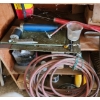 Image 6 : Contents of Garage Shelf Including: Air Hoses, Heavy Duty Farm Jacks and More!