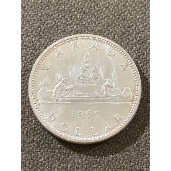 1965 Canadian Silver Dollar Featuring Canoe Design