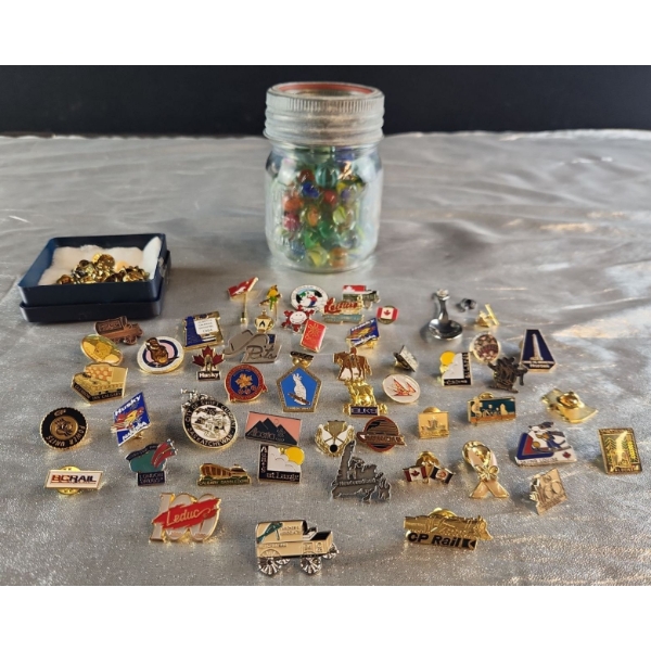 Collection of Vintage Canadian Souvenir Pins with a Jar of Marbles