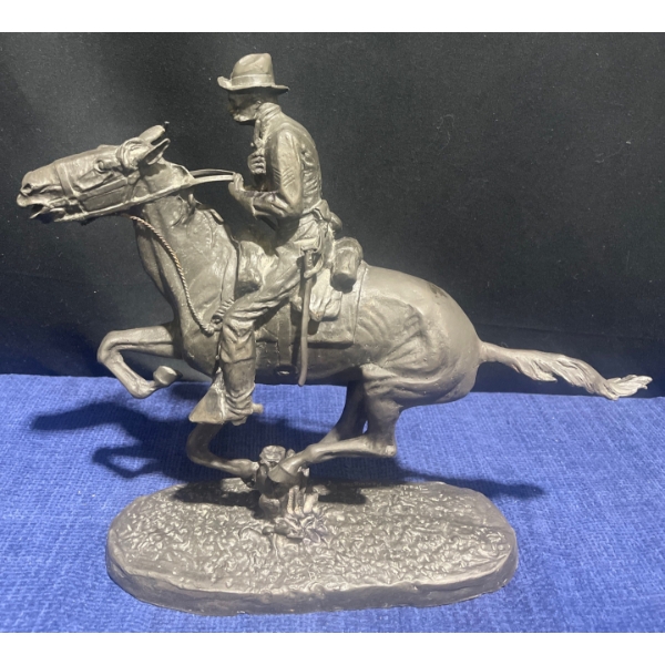 Frederic Remington's Cowboy Riding A Horse