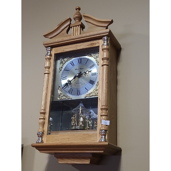 Daniel Dakota Light Wood Cabinet Clock with Westminster Chime and Rotating Dancers 20 L, 10 W, 5 D