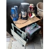 Image 1 : Coffee pot, lanterns, little table, and suitcase.

