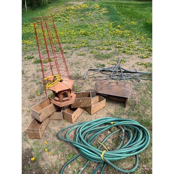 Gardening Items Including Hose, Planters, Tower, and Birdhouse