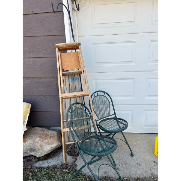Wooden ladder and folding metal chairs