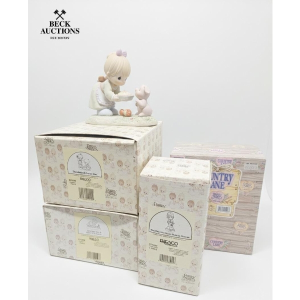 6 Precious Moments figurines Different Size 