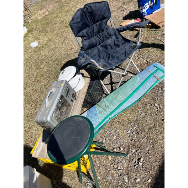 Camping chair, small stool woven RV mat, enamel pot and a Berkeley heater. 

