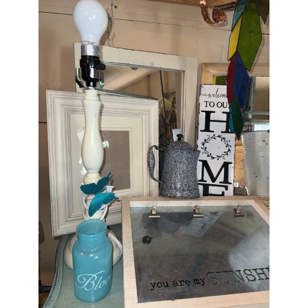 Home Decor Items Including Frames, Buckets, and Sign