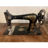 Image 2 : antique singer, sewing machine paddle driven with beautifully hand, carved sewing cabinet