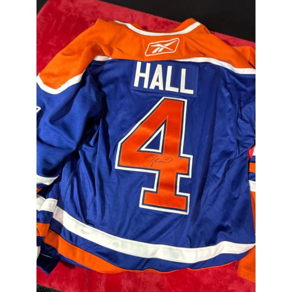 Taylor Hall Items including signed jersey