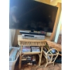 Image 1 : Samsung  40" TV With Panasonic VHS & DVD Player  With Assorted VHS & DVD's On Wicker Table 