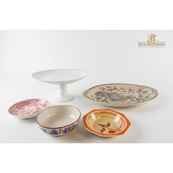 Collection Of Assorted Ceramic Dishes And A Footed Cake Stand.