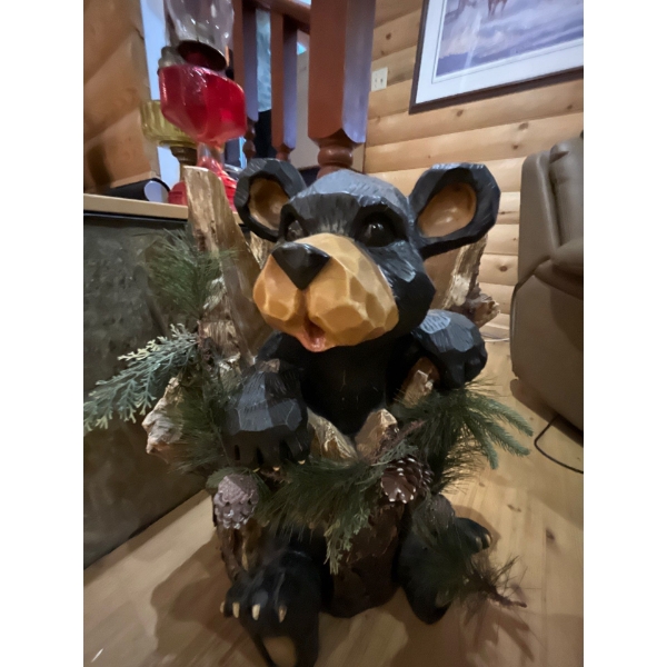 Set of bears sculptures would accent 22” length of the laying bare is 18 inches.