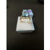 Image 2 : Beautiful emerald-cut topaz ring with small accent diamonds set in 10K gold