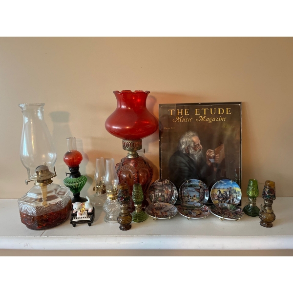 large collection of small, medium and large oil lamps all from the early 1900s