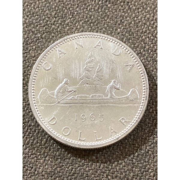 1965 Canada Silver Dollar Coin Featuring Canoe Reverse Design