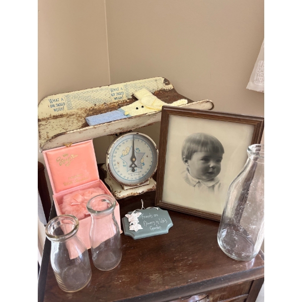 Antique baby scale with vintage milk bottles, vintage baby picture
