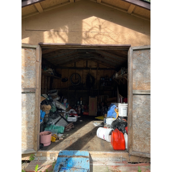 contents of shed several tarps, several buckets of coal pumps, dollies, Jerry cans, no delivery Brin