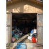 Image 1 : contents of shed several tarps, several buckets of coal pumps, dollies, Jerry cans, no delivery Brin
