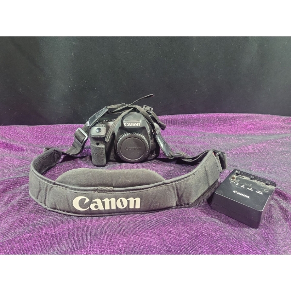 Canon EOS 7D Mark II DSLR With Strap, Cap, Battery, & Charger