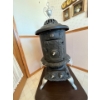 Image 1 :  antique cast iron parlor stove,# 19 in great condition. Must bring help to move .
