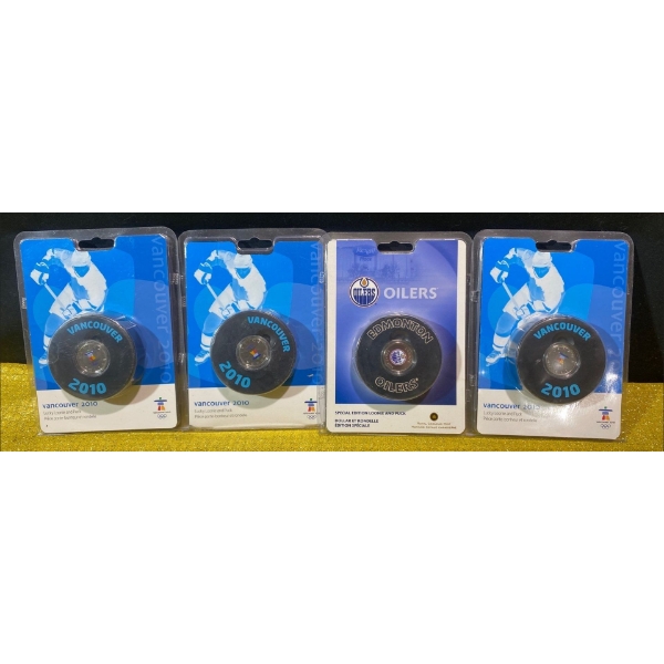 Royal Canadian Mint Special Edition Loonie and Puck Sets