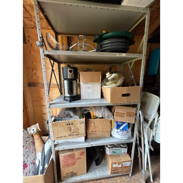 Metal shelf with hose mosquito net numerous disposable cups plates, forks knives, as well as several