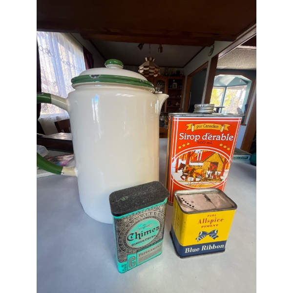 vintage enamel coffee pot with three vintage tins