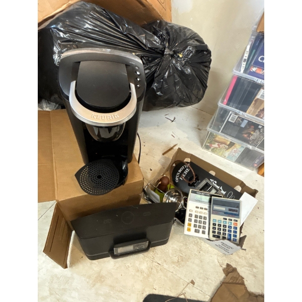 KEURIG new with docking station for Sirius box of calculators and miscellaneous collectables and a C