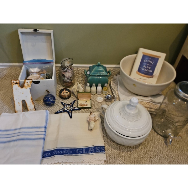 Household Items Including Glass Mason Jar, Ceramic Bowl, Linens, Toiletries, and Decorative Pieces