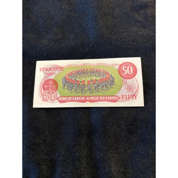 1975 uncirculated $50 bank Note RCMP Musical Ride Sn# EHL0382765 great addition for any collection

