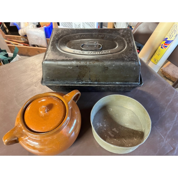  Black Beauty oven roaster, Bean Pot, and vintage round cake pan. 